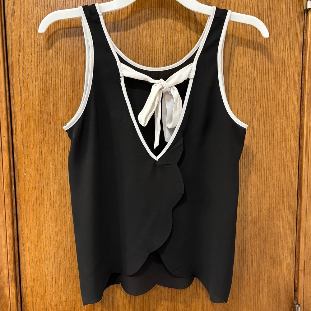 Charming Charlie black and white top with scalloped hem, small